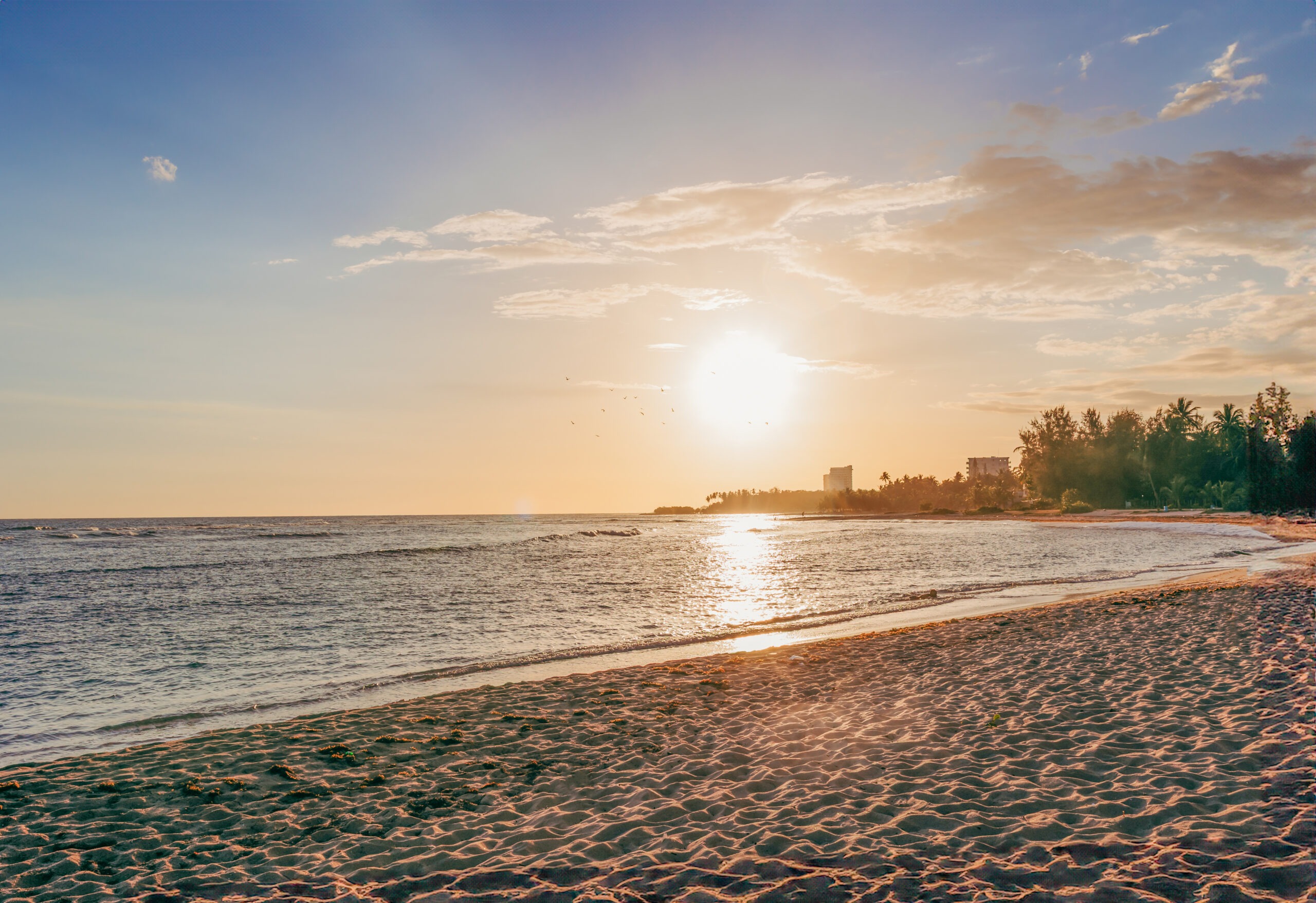 Sunset over tranquil beach landscape in Juan DOlio